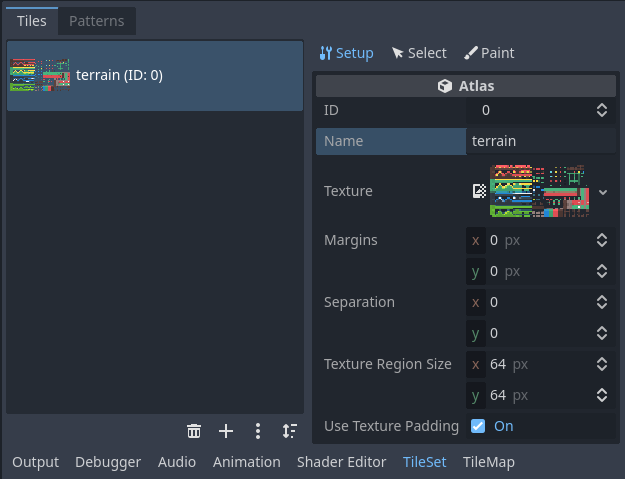 Ajustar las propiedades del atlas de TileSet en el inspector dedicado (parte del panel TileSet)
