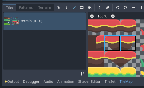 在TileMap編輯器中按住滑鼠左鍵可以選擇多個圖塊